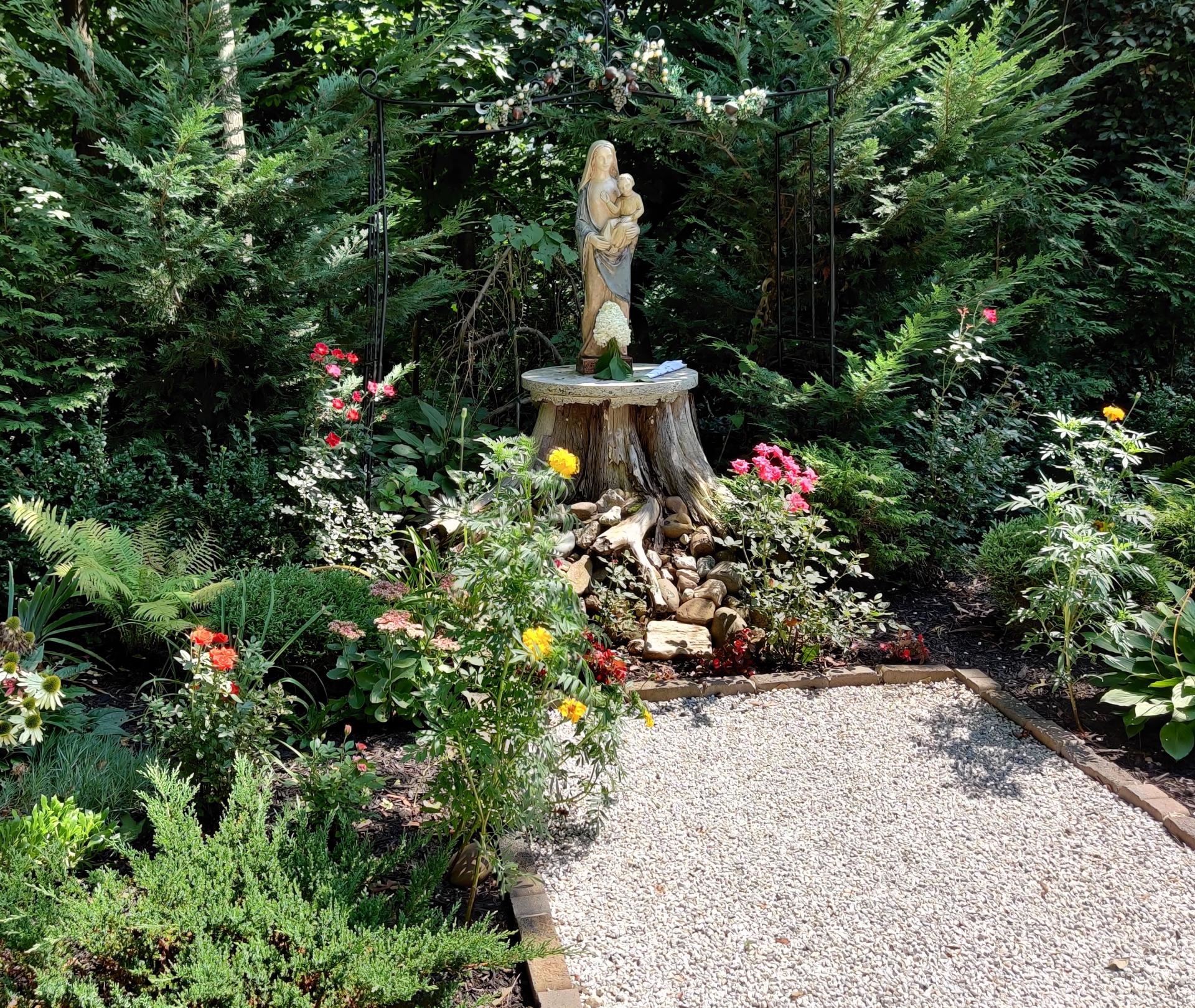 Our beautiful and peaceful Mary Garden in the back of the Retreat House.